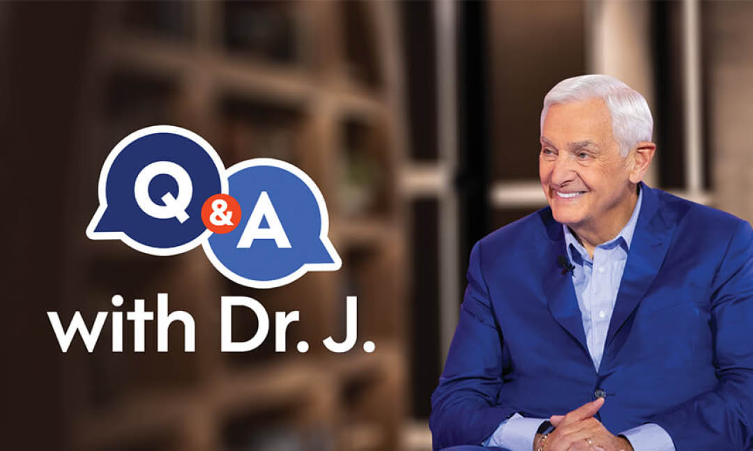 A man in a blue suit is smiling for a Q&A session. AI generated content