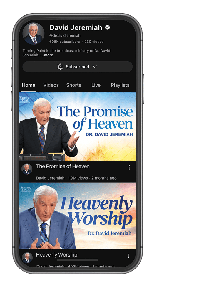 A cell phone screen displays a video of a man named David Jeremiah. AI generated content