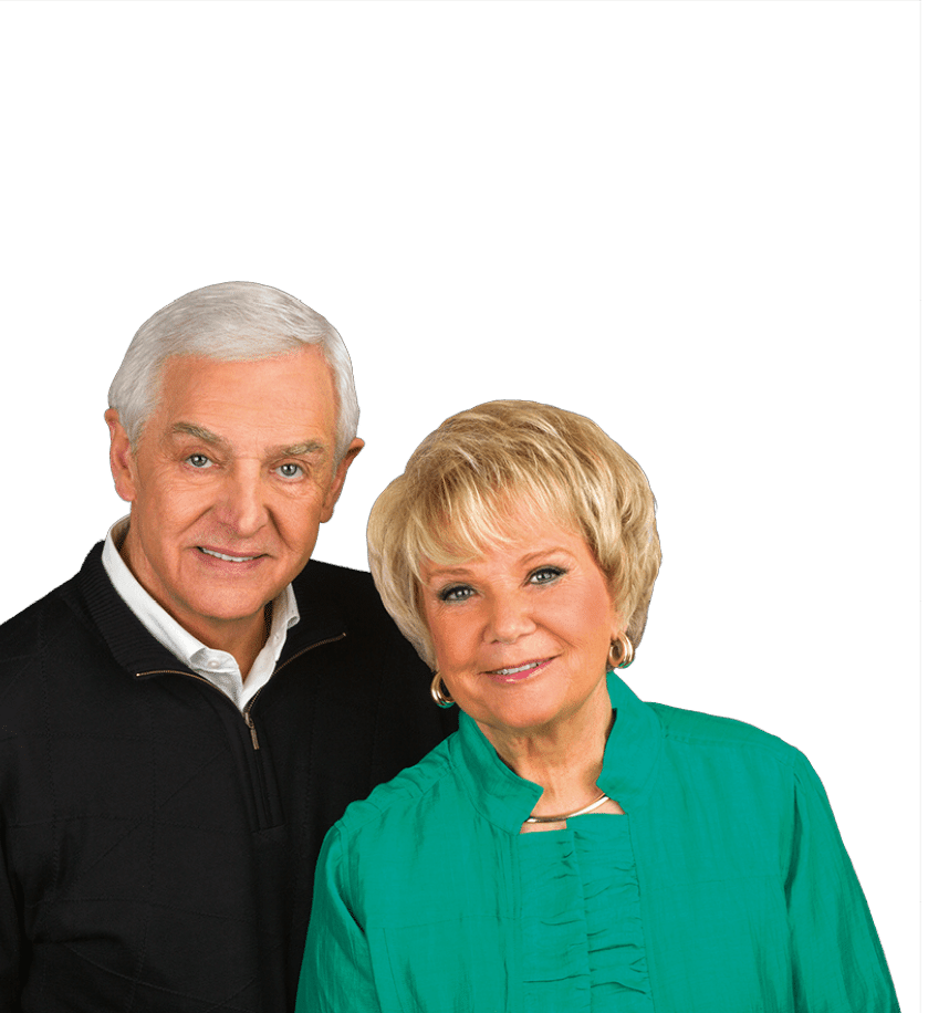 A man and a woman pose together for a picture. AI generated content