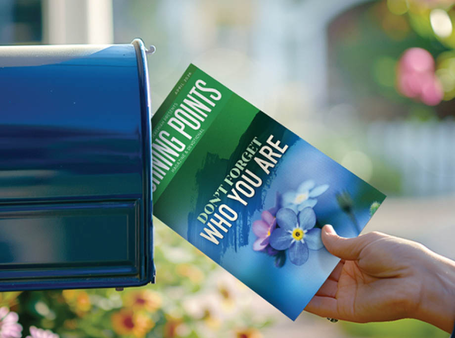 A person is holding a mailbox with a brochure for a gardening class. AI generated content