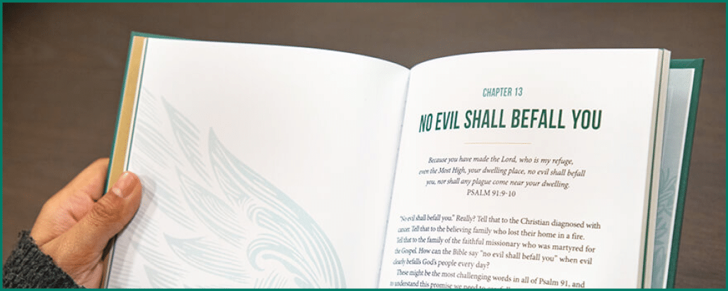 A person is holding an open book with a green and white cover. The book is titled “Me Shall Be Fearless" and is written in a foreign language. AI generated content