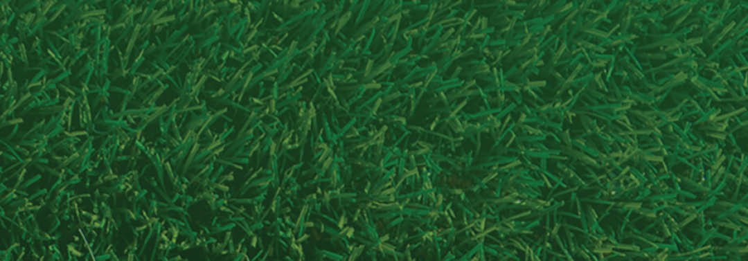 A green grassy field with a strip of green grass. AI generated content